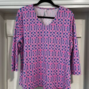 Leslie B top with great design. Bright colors make for great cruise wear.